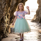 Full front view of Lavender Mint Lily Dress in a seaside setting
