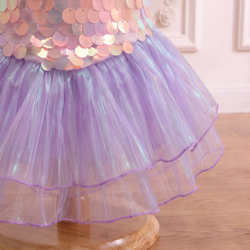 Close up of the layered lilac ruffle hem on the mermaid gown