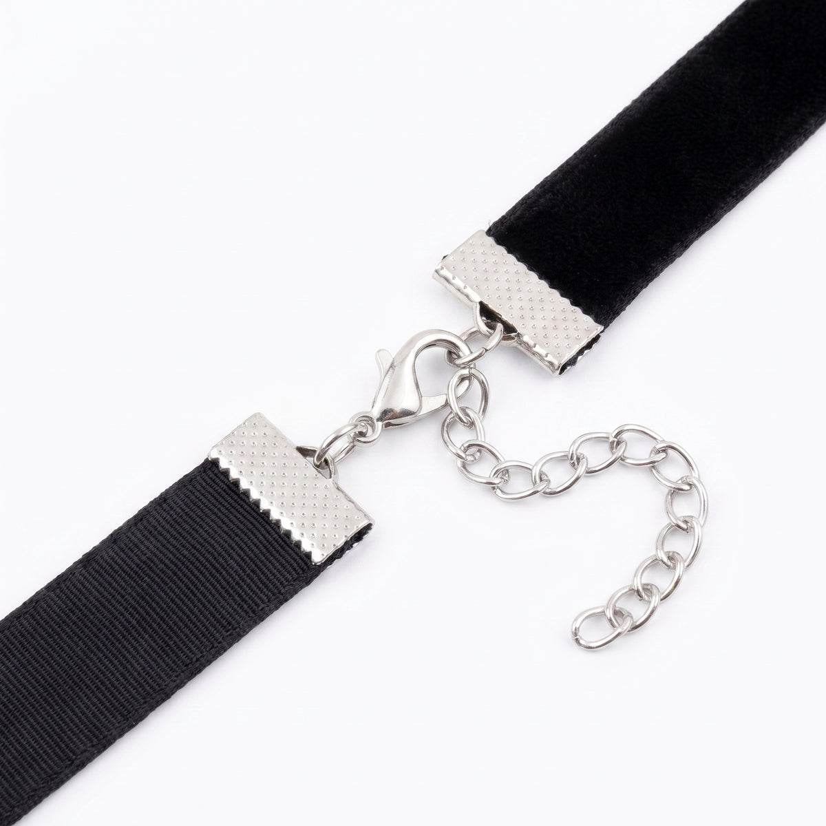 Close up of the choker's silver-tone clasp and adjustable extender chain