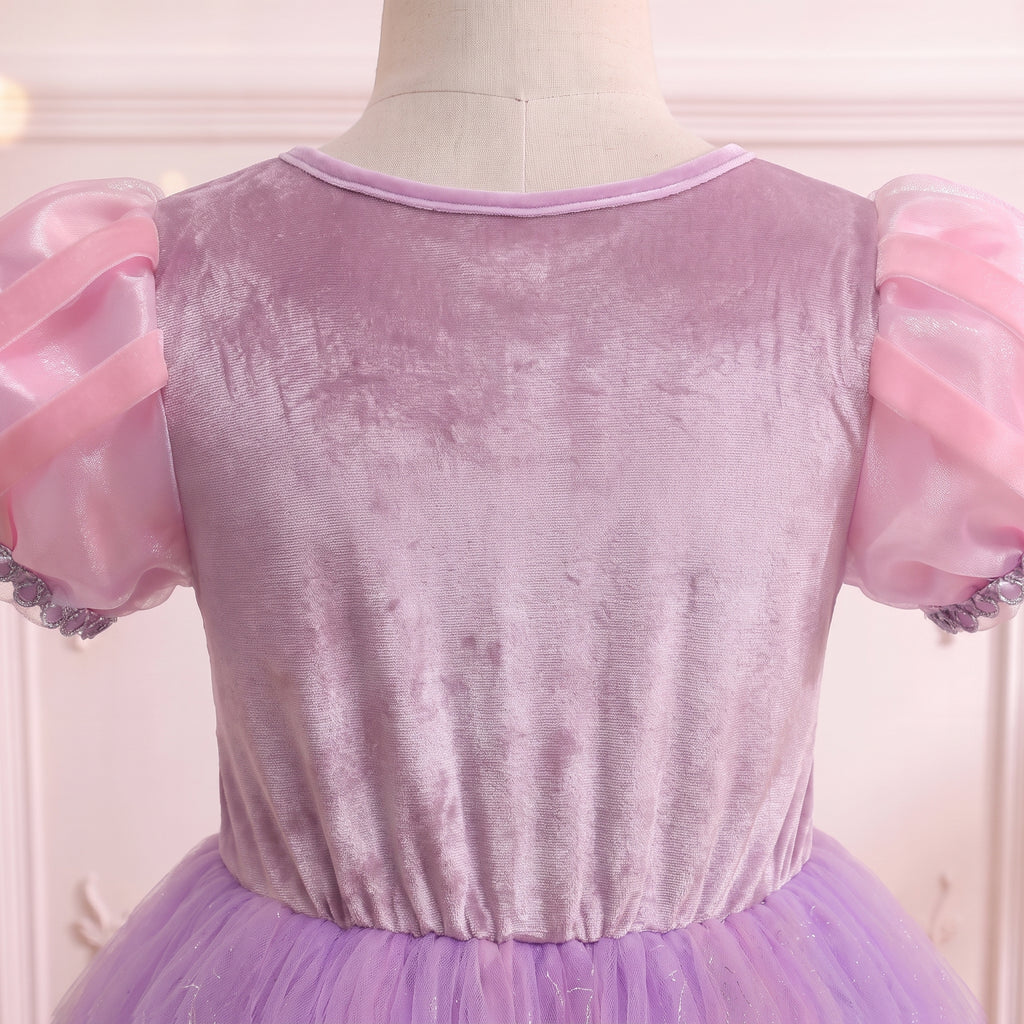 Close up of the back bodice of the Rapunzel gown: smooth lilac finish and sheer pink puff sleeves
