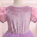 Close up of the back bodice of the Rapunzel gown: smooth lilac finish and sheer pink puff sleeves