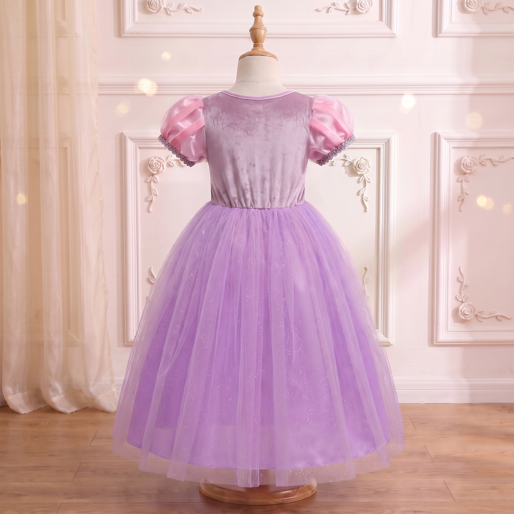 Back view of the Rapunzel Lavender Tower gown on a mannequin: smooth lilac back bodice and full lavender tulle skirt