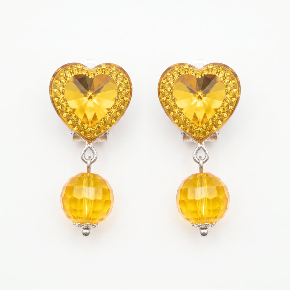 Yellow heart clip-on earrings with faceted yellow bead drops