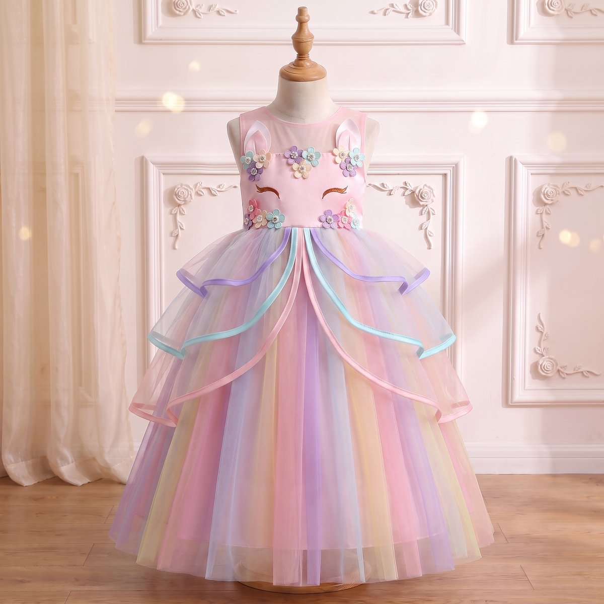 Front view of the Pink Rainbow Unicorn Ribbon Gown on a mannequin, dress only