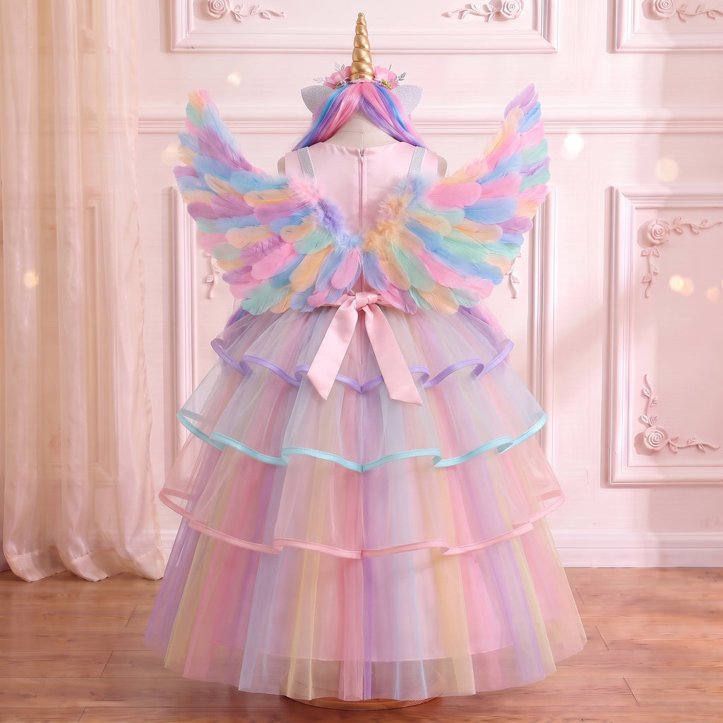 Back view of the pink unicorn gown on a mannequin showing the wings, satin bow and rainbow tulle tiers