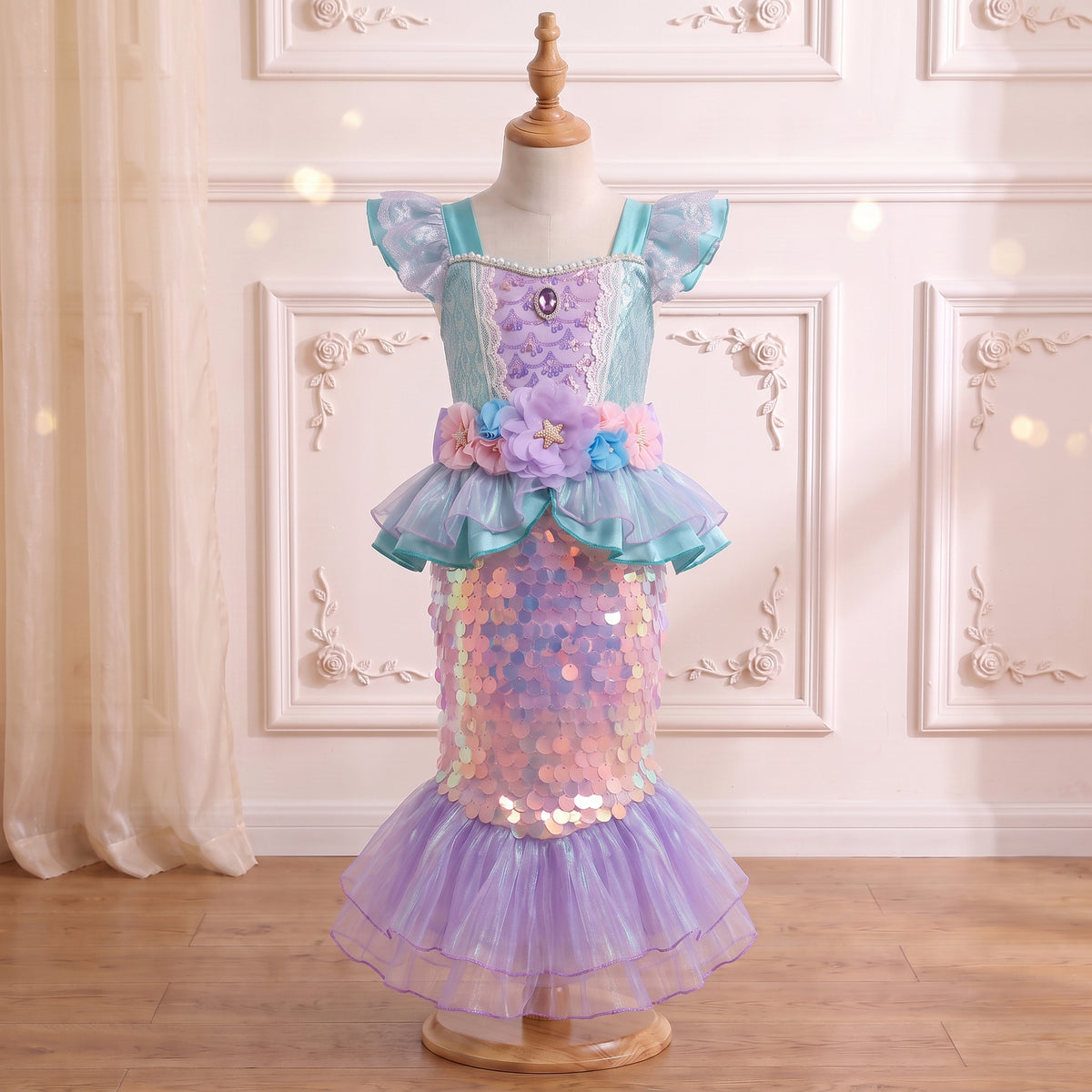 Front view of the Little Mermaid Shimmering Gown on a mannequin
