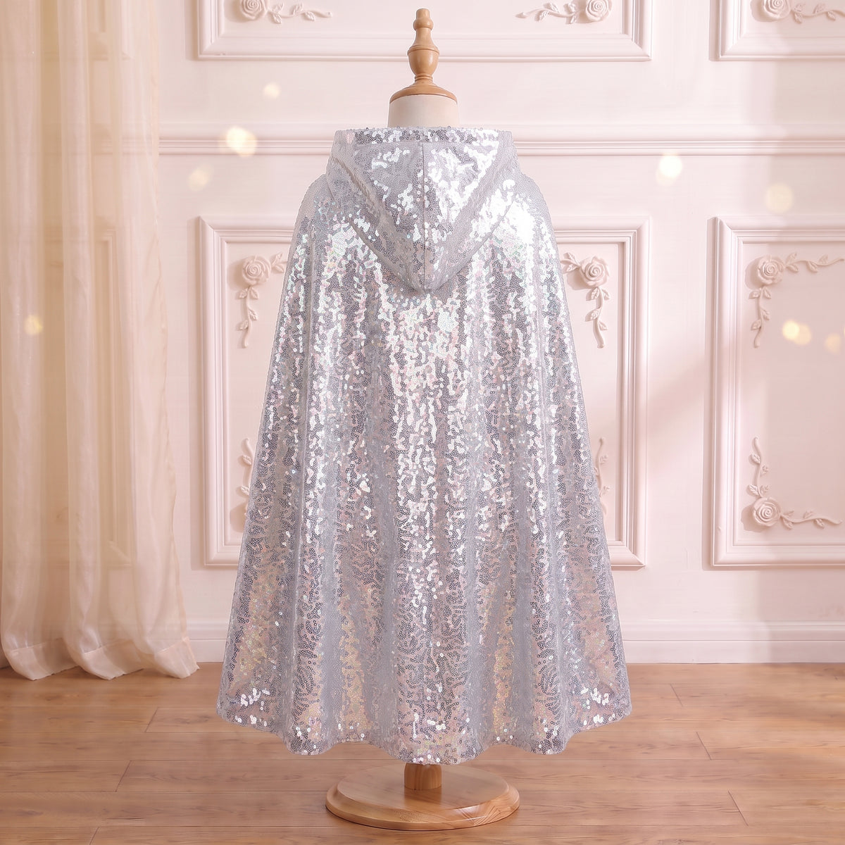 Back view of the Silver Sequined Cape on a mannequin
