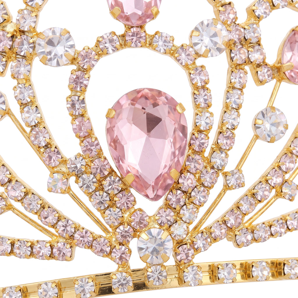 Close up of the pink teardrop stone at the center of the tiara