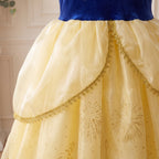 Castle Cape Dress — close up of peplum