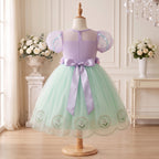 Back display of Lavender Mint Lily Dress with zipper and lavender bow