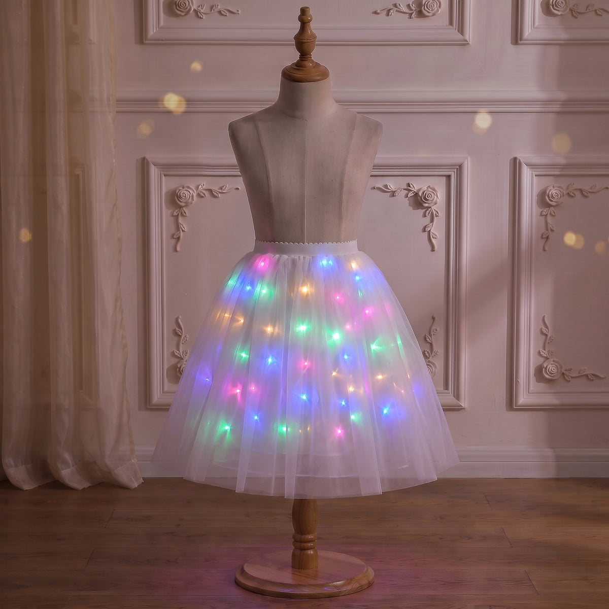 Rainbow LED Petticoat on a mannequin with the lights on, front view