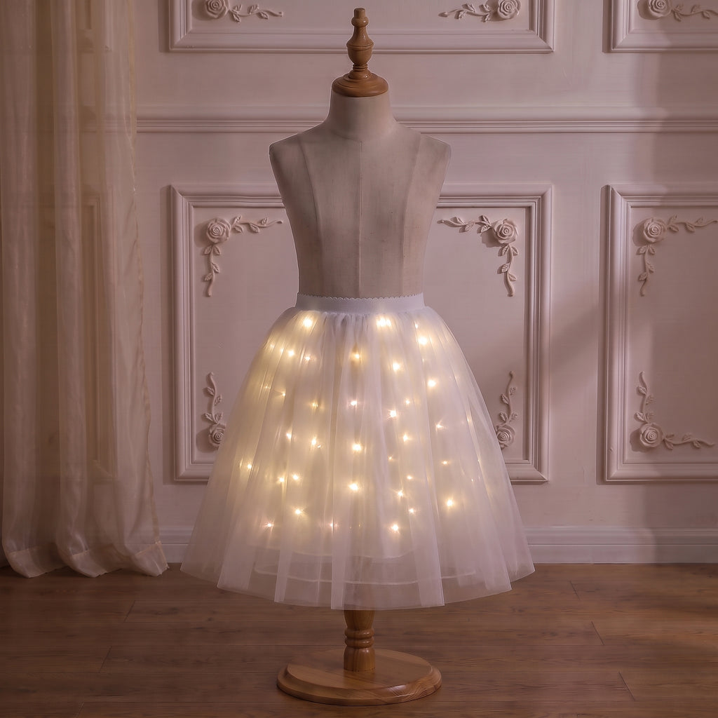 White Light-Up Petticoat on a mannequin with the lights on, side view