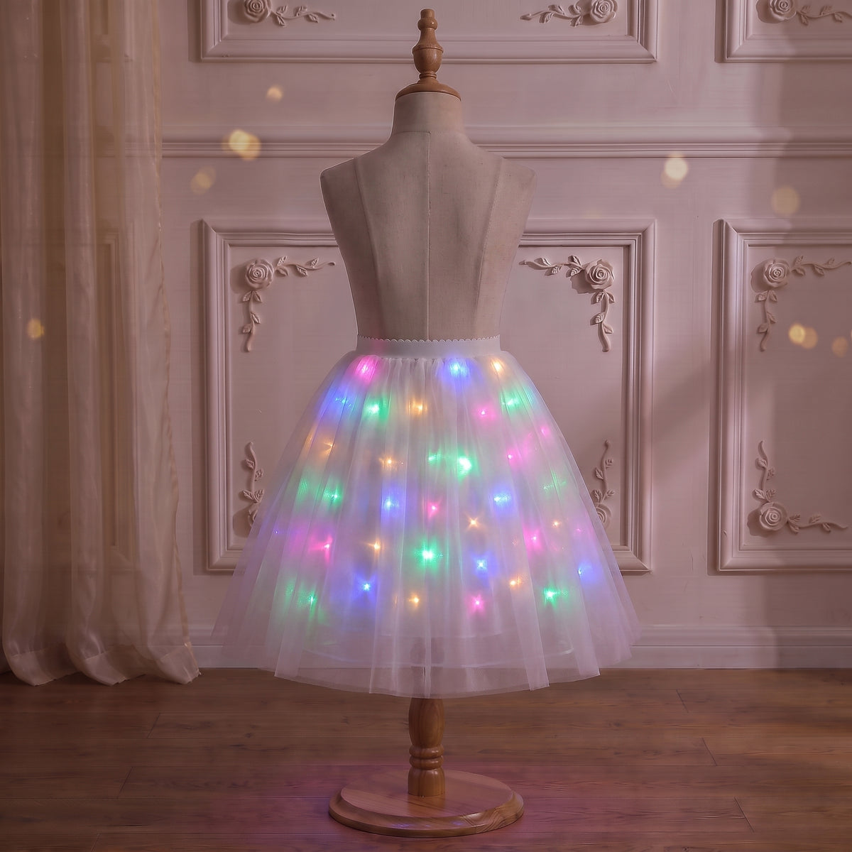Rainbow LED Petticoat on a mannequin with the lights on, side view