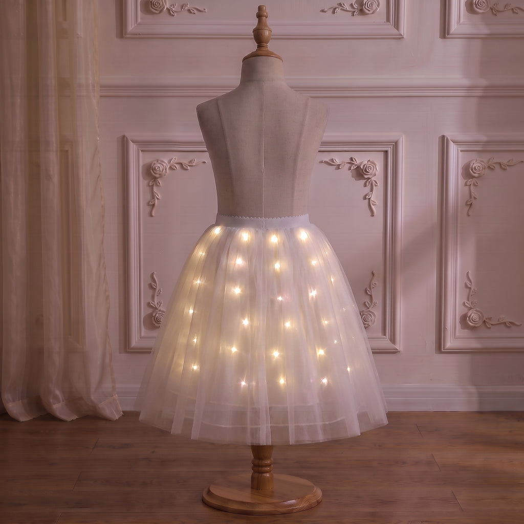 White Light-Up Petticoat on a mannequin with the lights on, front view