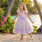 Pastel Mermaid Princess Gown shown on a child, with a sequined bodice, floral waist and layered pastel skirt