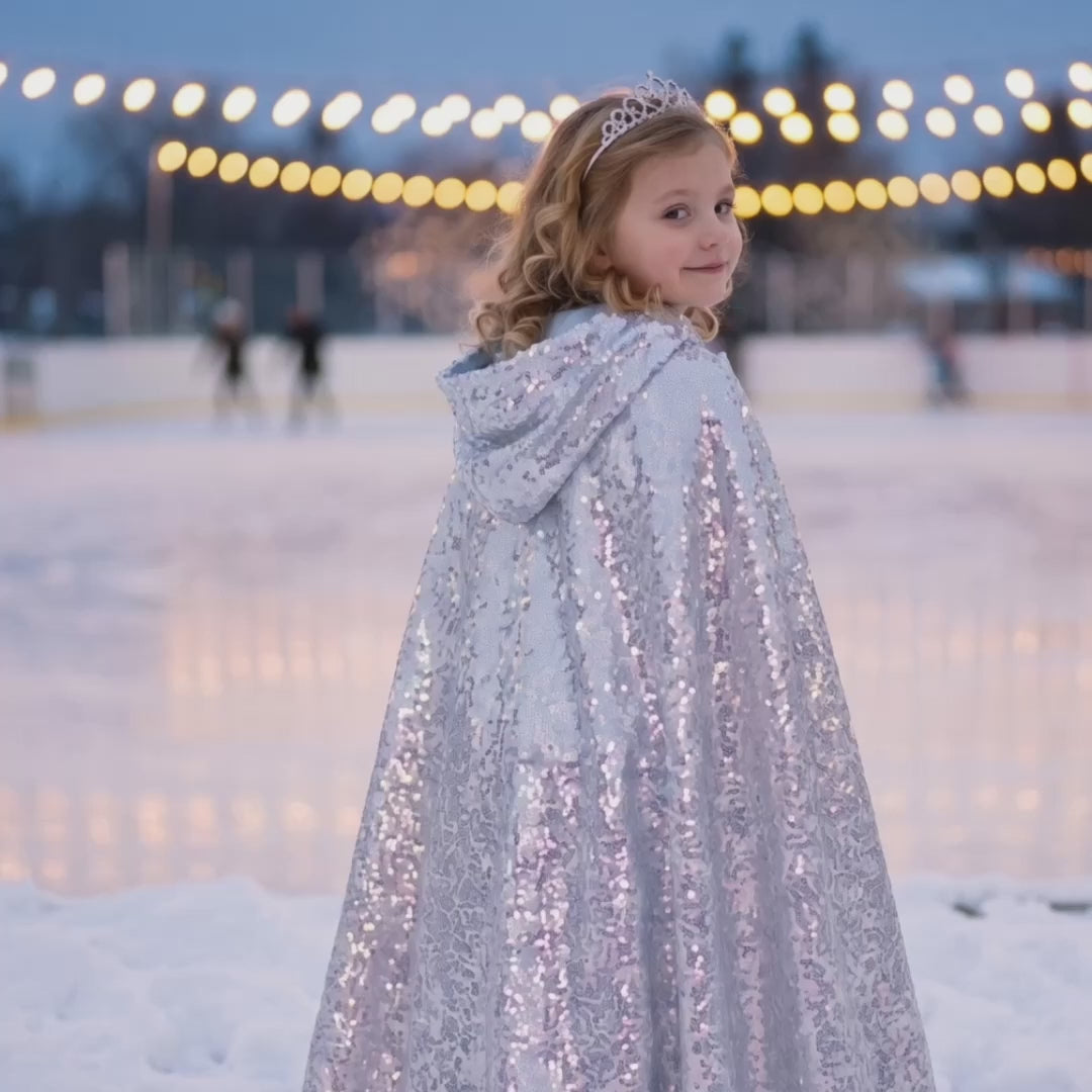 Silver Sequined Cape product video at the ice rink